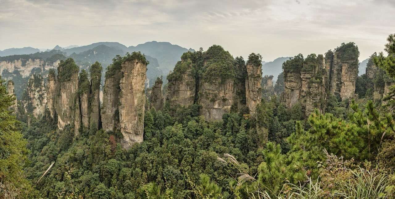 Zhangjiajie quartzite sandstone pinnacles and sea of clouds — Hunan Travel Guide cover